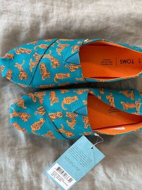 Toms Teal Canvas Slip-Ons with Orange Tiger Pattern